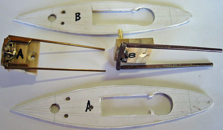 Commutator arm and shroud